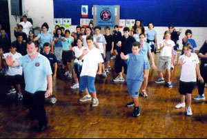 Allan leading students in Tai Chi exercises